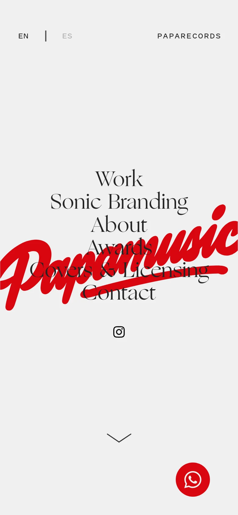 The mobile version maintains the minimalist light gray aesthetic and centered navigation menu, but the layout is vertically compressed to fit the narrower screen. The large red 'Papamusic' script logo remains a dominant background element behind the text links, and a red WhatsApp floating action button is visible in the bottom right corner.