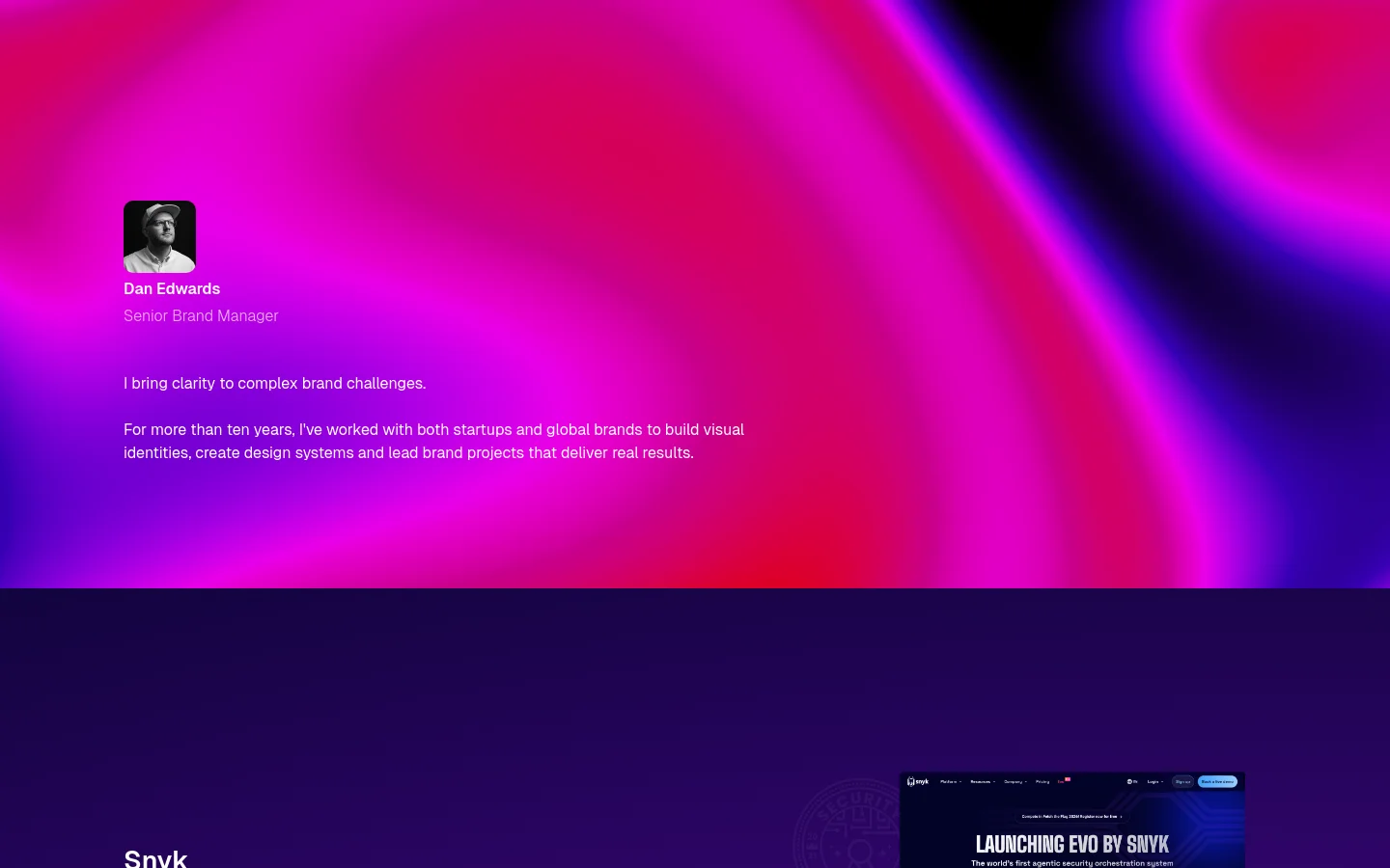 A desktop homepage featuring a vibrant, abstract gradient background of pink, purple, and dark blue. A small circular profile photo of Dan Edwards is positioned on the left, next to his name, title, and a brief professional introduction in white text. The layout is spacious with a minimalist design.