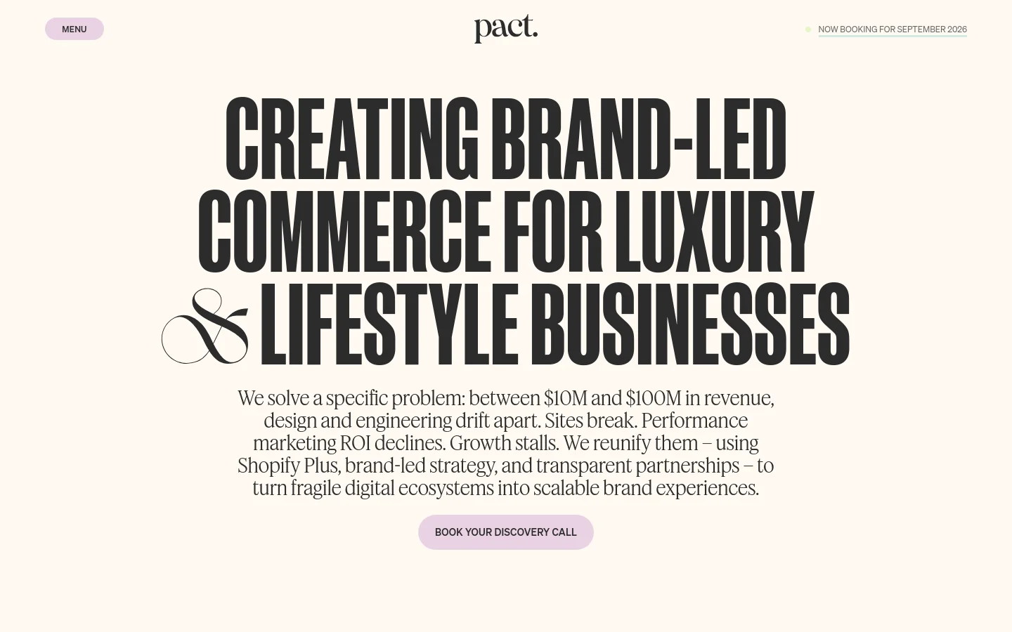Desktop homepage for Pact featuring a minimalist cream background with large, bold black typography reading 'CREATING BRAND-LED COMMERCE FOR LUXURY & LIFESTYLE BUSINESSES'. Below the headline is a paragraph of text and a light purple 'BOOK YOUR DISCOVERY CALL' button, with a client logo grid starting below.