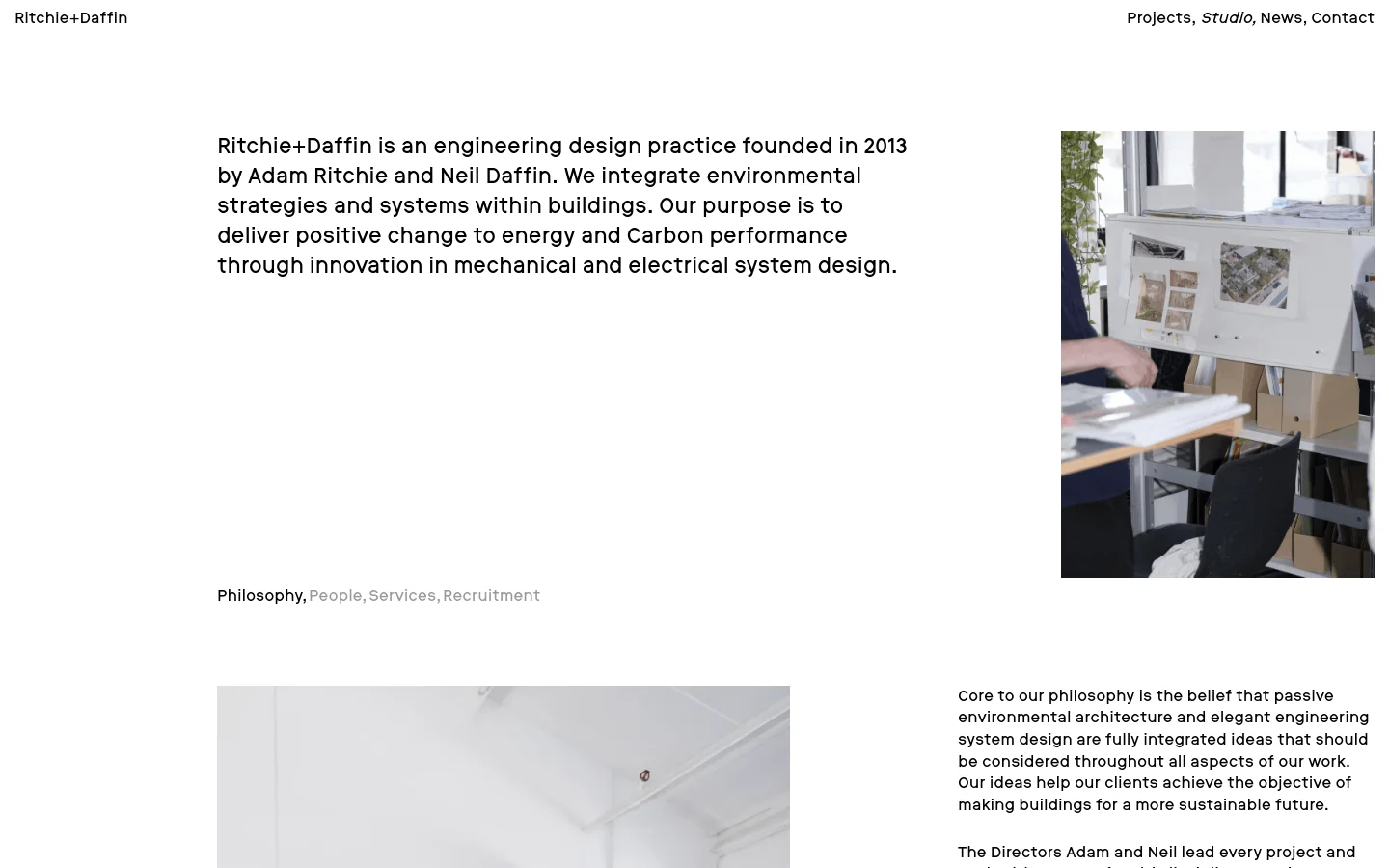 The Studio page features a clean, minimalist layout with black text on a white background. A large text block introduces the engineering practice on the left, paired with a vertical rectangular photograph of a studio workspace on the right. Navigation links for Projects, Studio, News, and Contact are located at the top right.