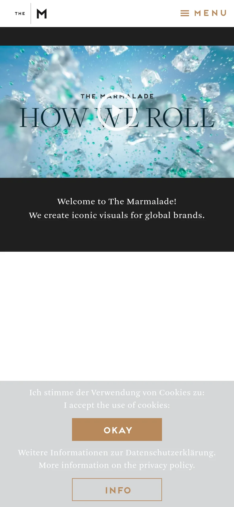The mobile version presents a simplified vertical layout with a large hero video at the top and a hamburger menu icon labeled 'MENU' in the header. The text 'Welcome to The Marmalade!' is centered below the video, and the cookie consent banner at the bottom features large, full-width 'OKAY' and 'INFO' buttons.