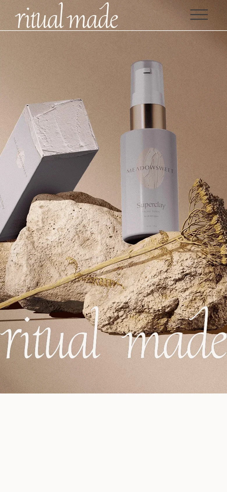 The mobile version shows a vertically oriented hero image of the same skincare products on rocks, with the 'ritual made' script logo prominently displayed at the top. A hamburger menu icon is located in the top right corner, and the layout is streamlined for a single-column view.