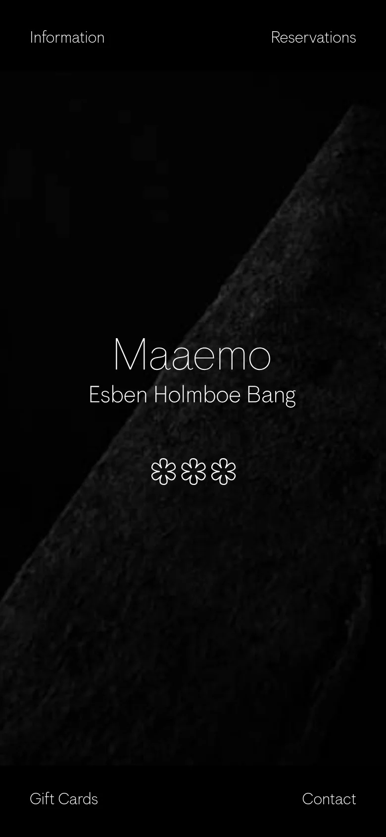 The mobile version maintains the same dark, minimalist design and central text layout as the desktop version. The diagonal stone texture remains the primary background element, and the navigation links are positioned at the corners of the screen.