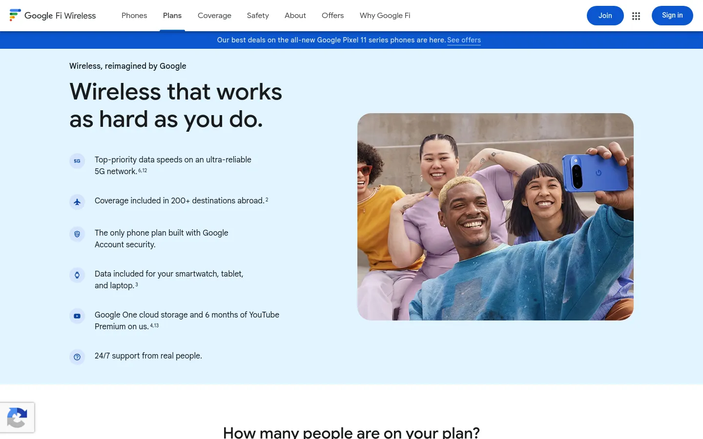 The desktop page features a clean, light blue background with a large headline reading 'Wireless that works as hard as you do.' To the right, a large photograph shows a diverse group of friends taking a selfie. A list of service benefits with blue icons is positioned on the left, and a blue announcement banner sits at the top of the page.