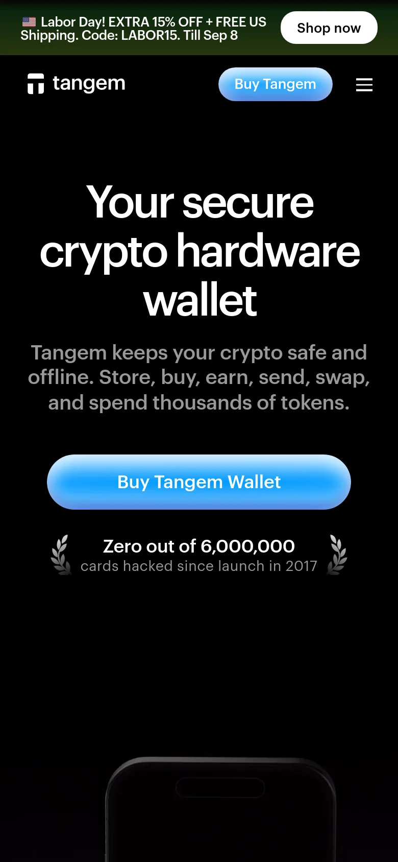 The mobile version presents a simplified vertical layout with a hamburger menu icon and a blue 'Buy Tangem' button in the header. The hero section features the same large white headline and subheadline on a black background, with the primary 'Buy Tangem Wallet' button spanning a wider portion of the screen. The promotional banner remains visible at the top of the viewport.