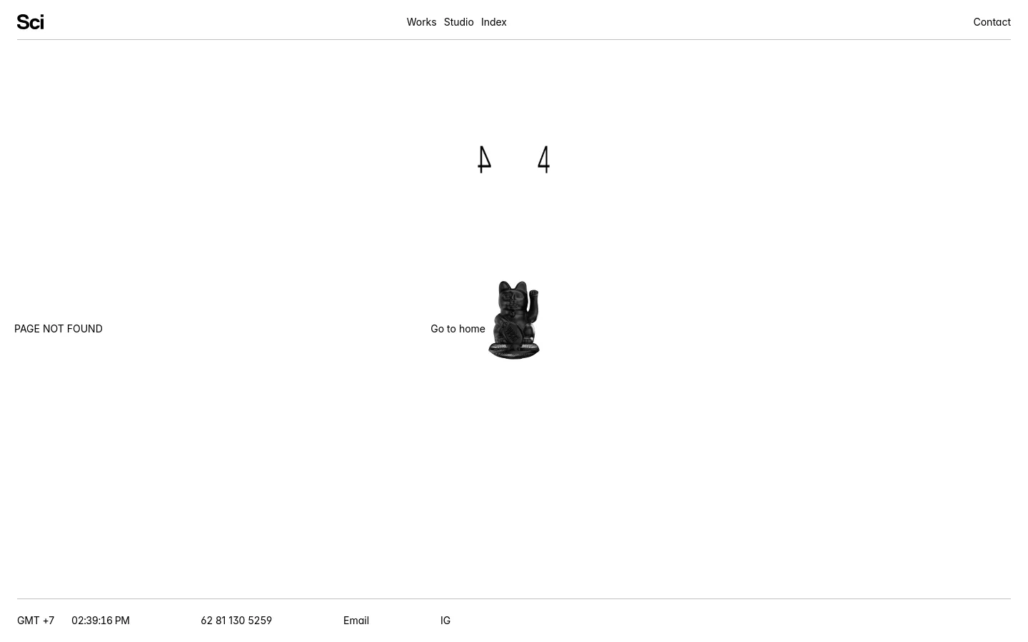 A minimalist 404 error page on a white background with black text. The large numbers '4 0 4' and the text 'PAGE NOT FOUND' are centered, accompanied by a small black Maneki-neko figurine and a 'Go to home' link. The navigation menu includes Works, Studio, Index, and Contact, while the footer contains contact details and social links.