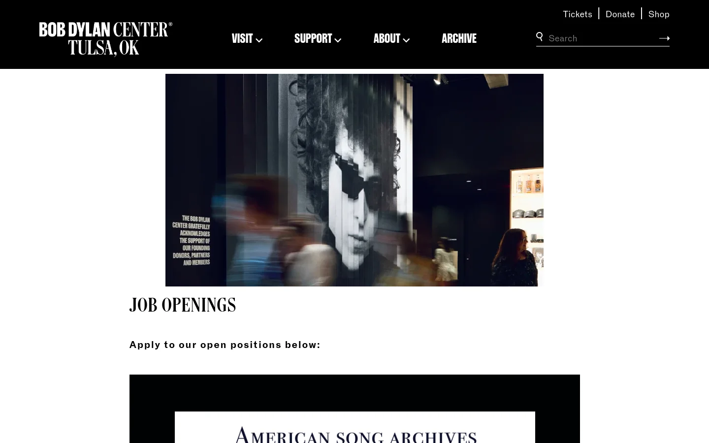 The desktop version of the Job Openings page features a black header with the Bob Dylan Center logo and navigation links for Visit, Support, About, and Archive. A large hero image shows a black and white portrait of Bob Dylan in a gallery setting, followed by the headline 'JOB OPENINGS' and the text 'Apply to our open positions below:' on a white background.
