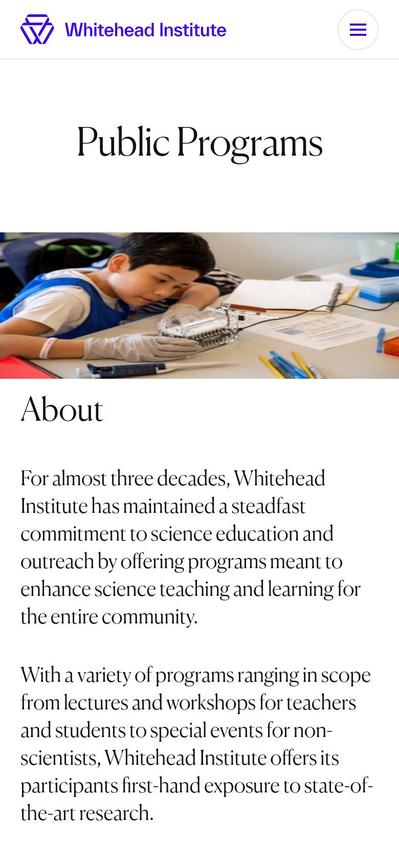 The mobile version simplifies the layout, replacing the horizontal navigation bar with a hamburger menu icon next to the Whitehead Institute logo. The 'Public Programs' headline and the large hero image of a student in a lab remain prominent, but the content is stacked vertically to fit the narrow screen width.