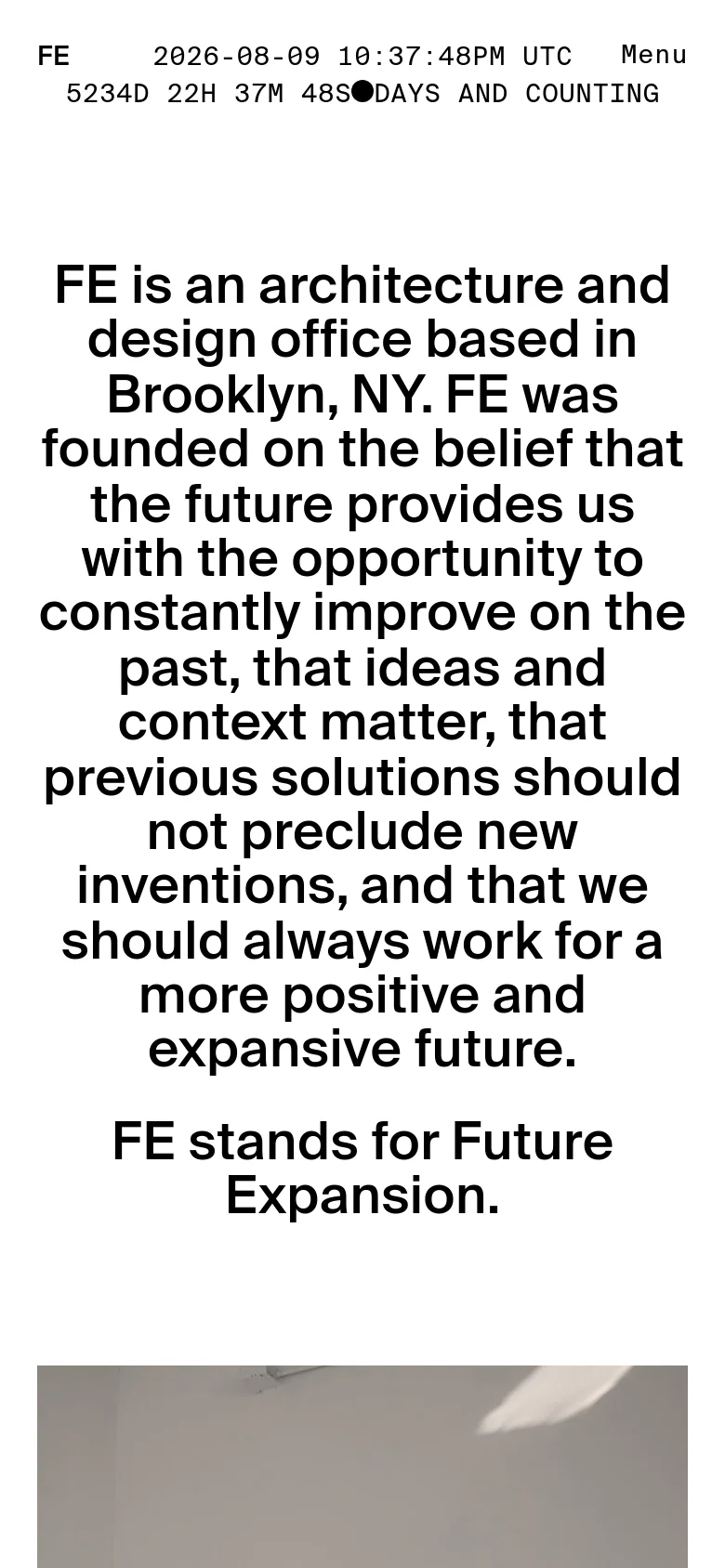 The mobile version maintains the minimalist white and black design but stacks the content vertically. The top navigation is replaced by a 'Menu' button, and the large central text is reflowed into a single column to fit the narrower screen width.