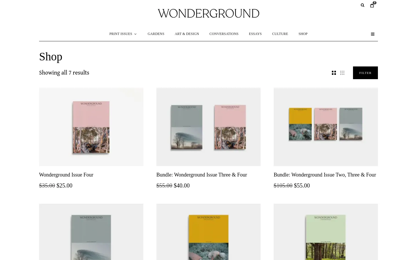 The desktop shop page features a clean, minimalist layout with a white background and black serif typography. A grid of product images displays various magazine issues and bundles, each with a title, original price (struck through), and sale price below. A 'Filter' button and view toggle icons are located at the top right of the product grid.