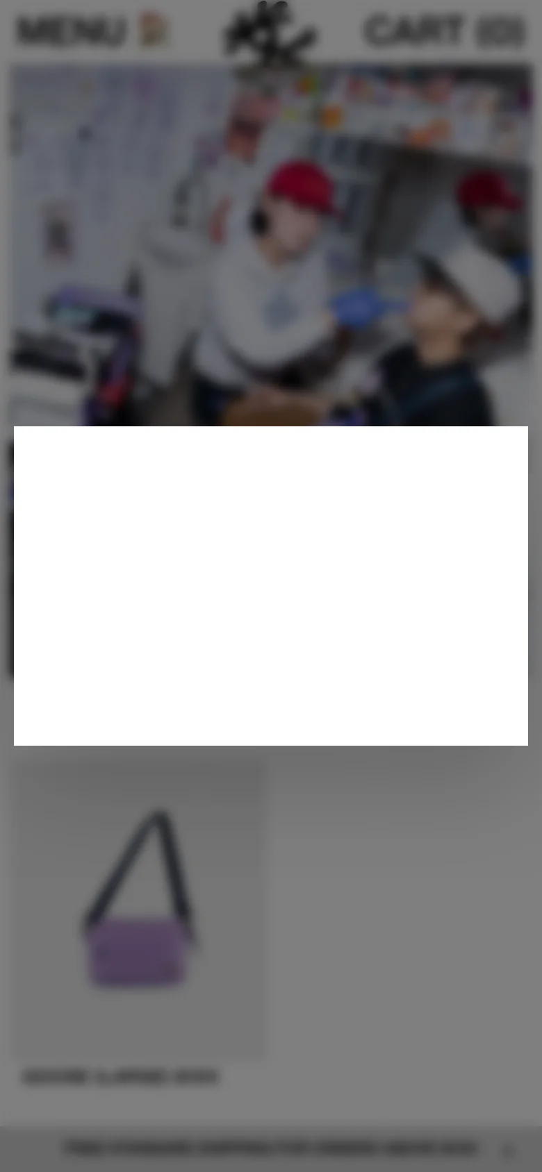 The mobile version presents a single-column vertical scroll of the product grid, emphasizing large, high-quality images of colorful bags. The header is simplified with a 'MENU' toggle and 'CART' indicator, and a promotional banner for free shipping is visible at the bottom.