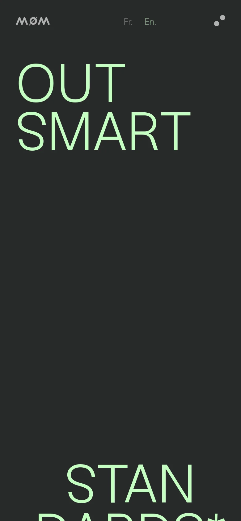 The mobile version presents a simplified, vertically stacked layout with the MØM logo and language options at the top. The hero section features the same oversized, light-green 'OUT SMART' text against a dark background, optimized for a narrow screen. The navigation is condensed, and the project grid transitions into a single-column scrollable format.