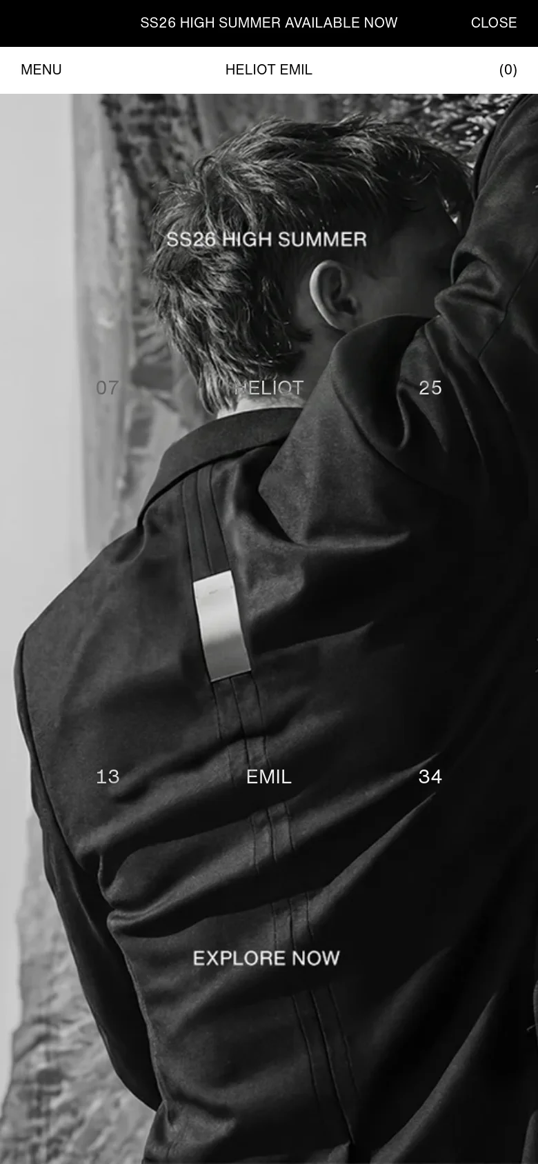 The mobile version presents a vertically oriented, full-screen black and white hero image of a person in a dark jacket. The layout is simplified with a top navigation bar containing a 'MENU' toggle, the 'HELIOT EMIL' logo, and a cart indicator. The 'SS26 HIGH SUMMER' text and 'EXPLORE NOW' button are centered over the portrait-style imagery.