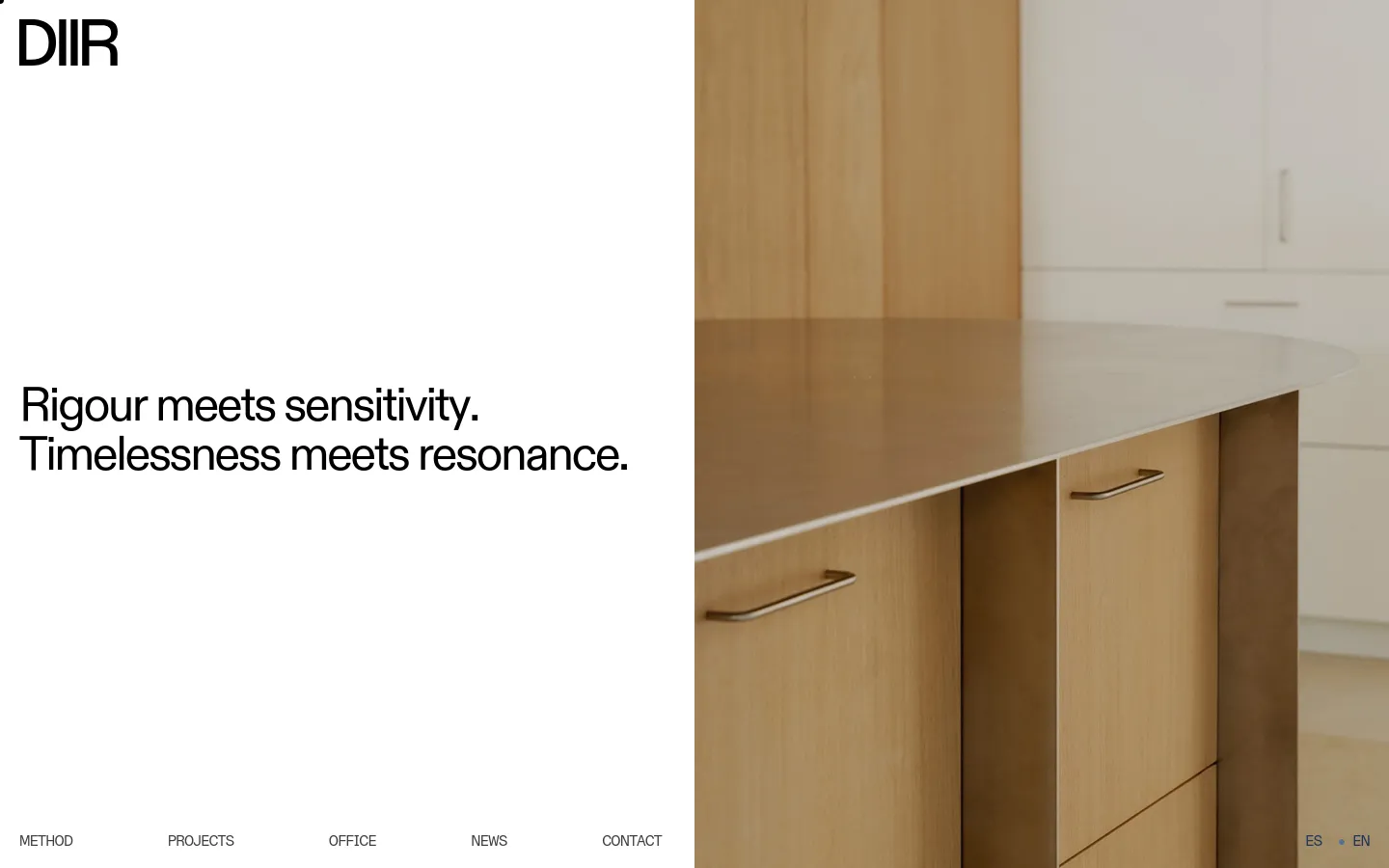 The DIIR homepage features a minimalist layout with a split screen. The left side is white with the 'DIIR' logo, the headline 'Rigour meets sensitivity. Timelessness meets resonance.', and a bottom navigation menu. The right side shows a high-quality photograph of a modern kitchen with light wood cabinetry and a smooth countertop.