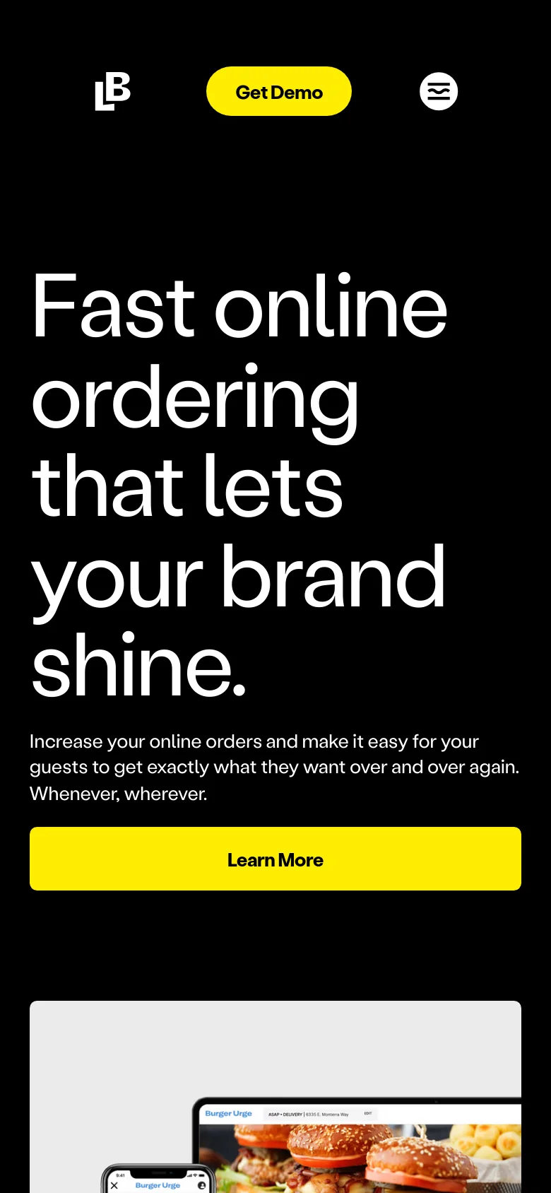 The mobile version presents a vertical layout with the large white headline and subheadline stacked above a full-width yellow 'Learn More' button. The black background dominates the top half, while the product imagery of the laptop and smartphone is positioned below the primary call to action. The navigation is simplified, focusing on the brand logo and the prominent yellow 'Get Demo' button.