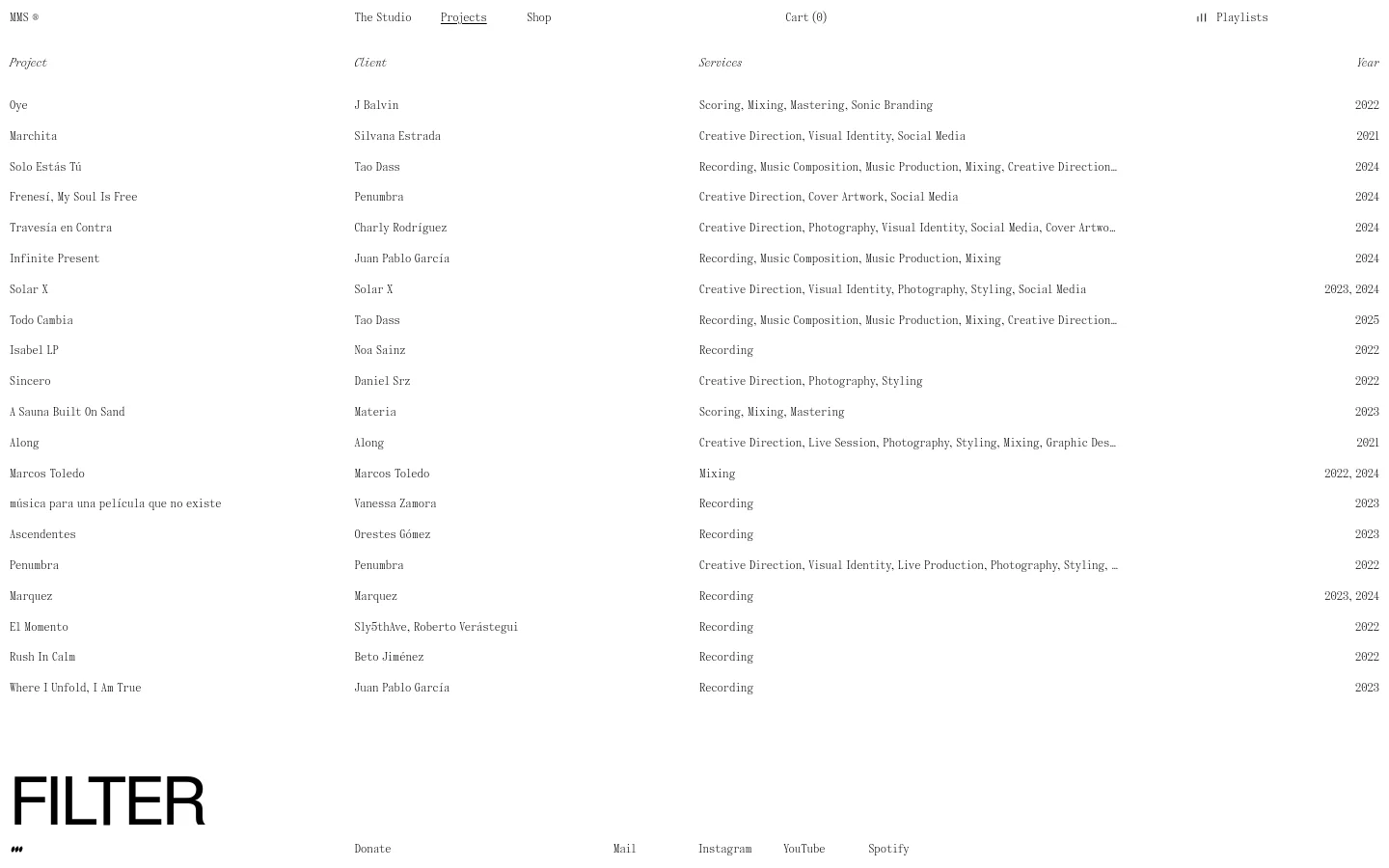 The desktop page features a minimalist design with a white background and black text, displaying a project portfolio in a clean grid layout. Each entry includes the project name, client, services provided, and year, with some entries accompanied by large, grayscale rectangular images. Navigation links for The Studio, Projects, Shop, Cart, and Playlists are located at the top.