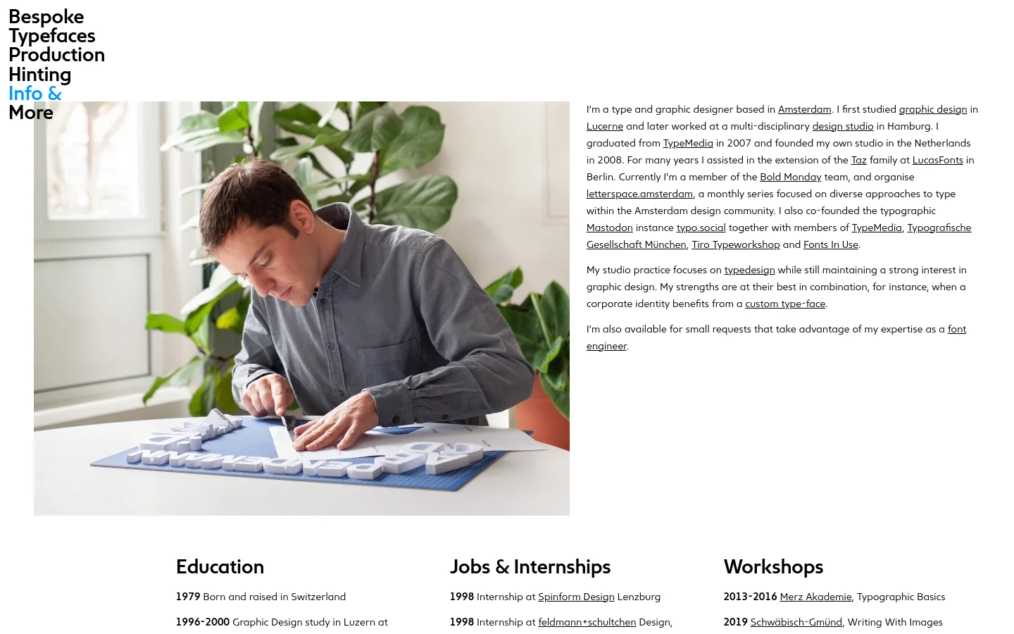 A desktop view of the 'About' page featuring a large hero image of designer Edgar Walthert working with 3D paper artwork. To the left, a vertical sidebar contains navigation links like 'Typefaces' and 'Production,' while the main content area uses a clean, minimalist layout with black text on a white background and several hyperlinked paragraphs.