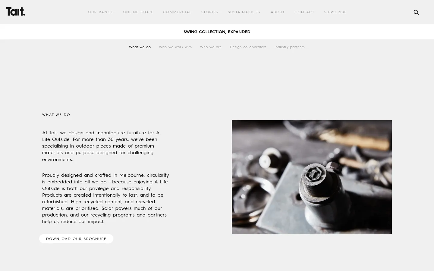 The desktop About page features a clean, minimalist layout with a white background and black text. A side-by-side section shows the 'What we do' heading and descriptive text on the left, paired with a close-up, high-quality photograph of industrial metal bolts and manufacturing components on the right. A 'DOWNLOAD OUR BROCHURE' button is positioned below the text.