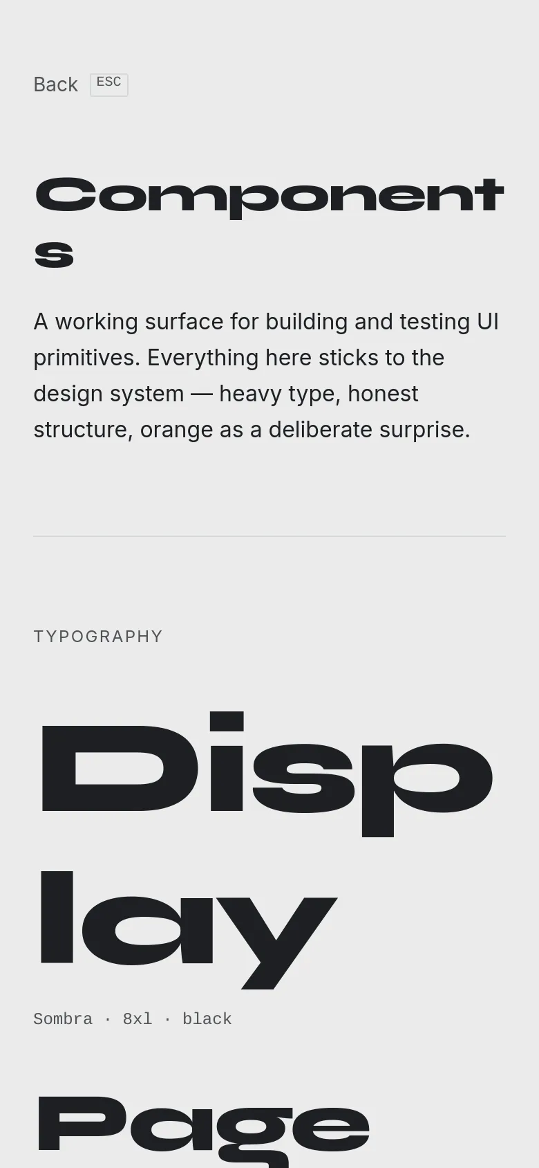 The mobile version presents a simplified single-column layout with the large 'Components' headline and introductory text at the top. The abstract black brushstroke graphic is repositioned or scaled to fit the narrower viewport, and the typography scales and UI components are stacked vertically for easy scrolling.