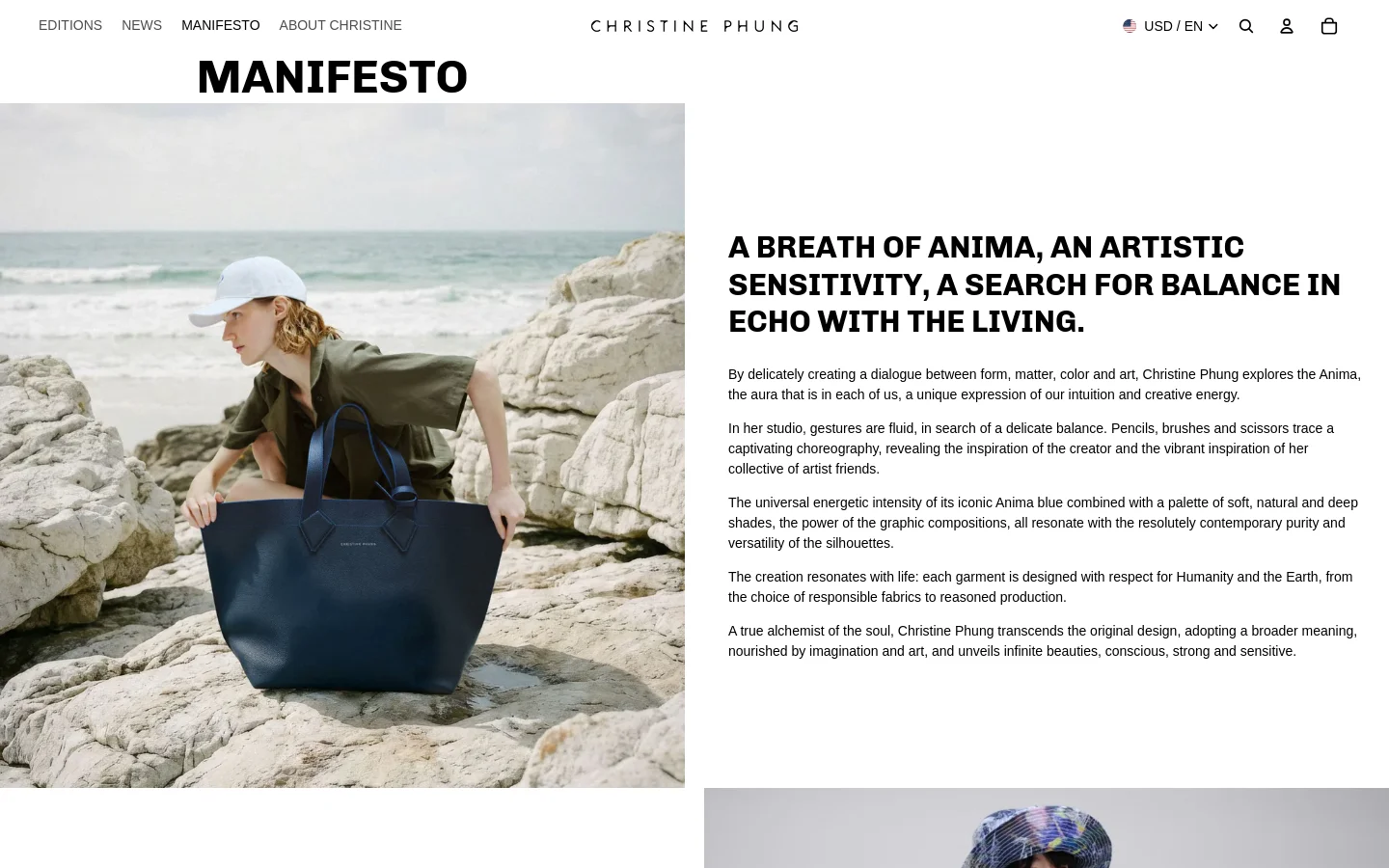 The desktop page features a large 'MANIFESTO' heading above a hero image of a person in a white cap and olive shirt sitting on coastal rocks with a large blue tote bag. To the right, a text block describes the brand's artistic philosophy using bold, uppercase subheadings. The layout is clean with a white background and a minimalist navigation bar at the top.