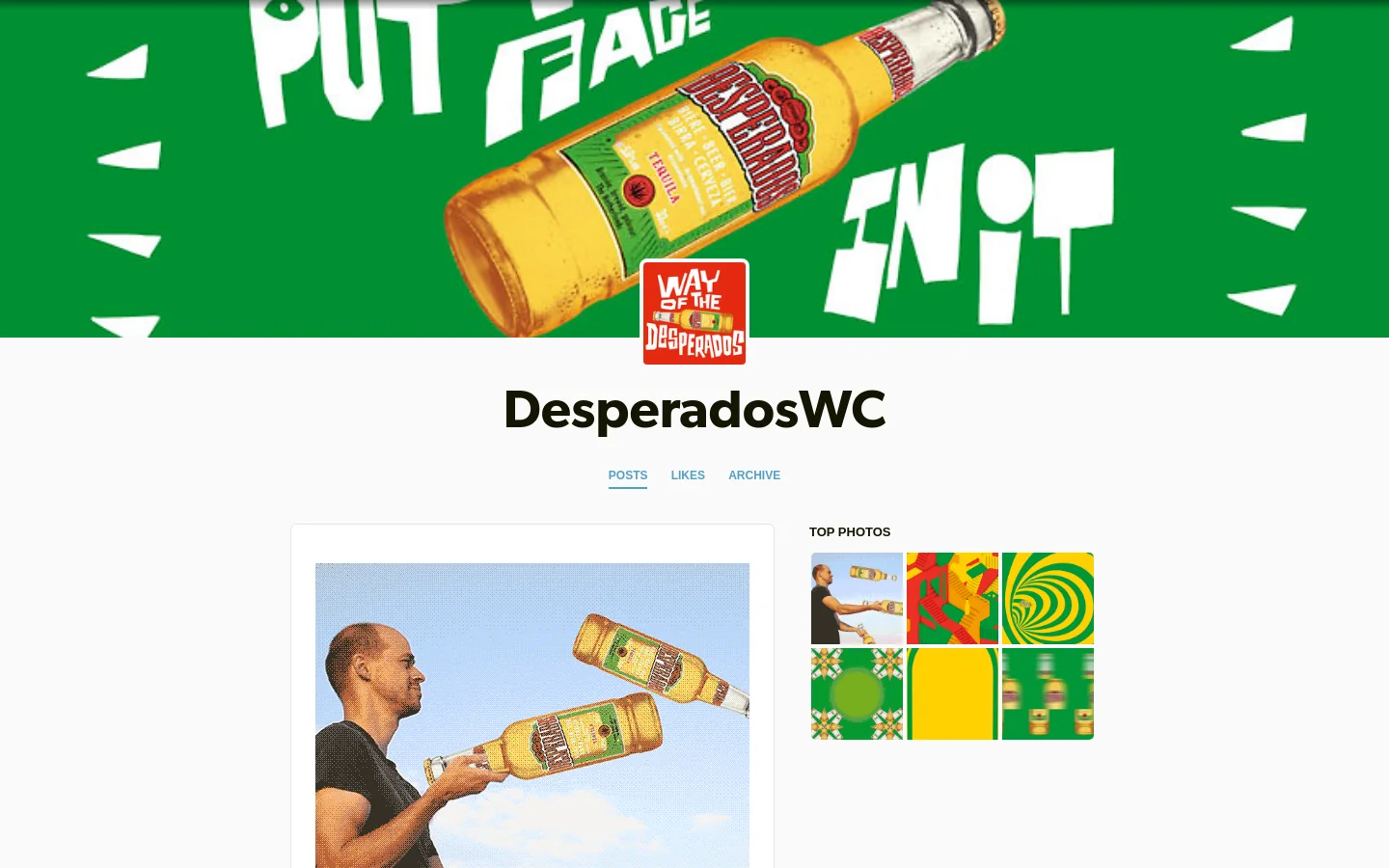 The DesperadosWC Tumblr homepage features a vibrant green header with large white stylized text and a Desperados beer bottle. Below the header, the title 'DesperadosWC' is displayed in large black font above navigation links for Posts, Likes, and Archive. A main content area shows a large GIF of a man holding two beer bottles against a blue sky, accompanied by hashtags and social sharing options.