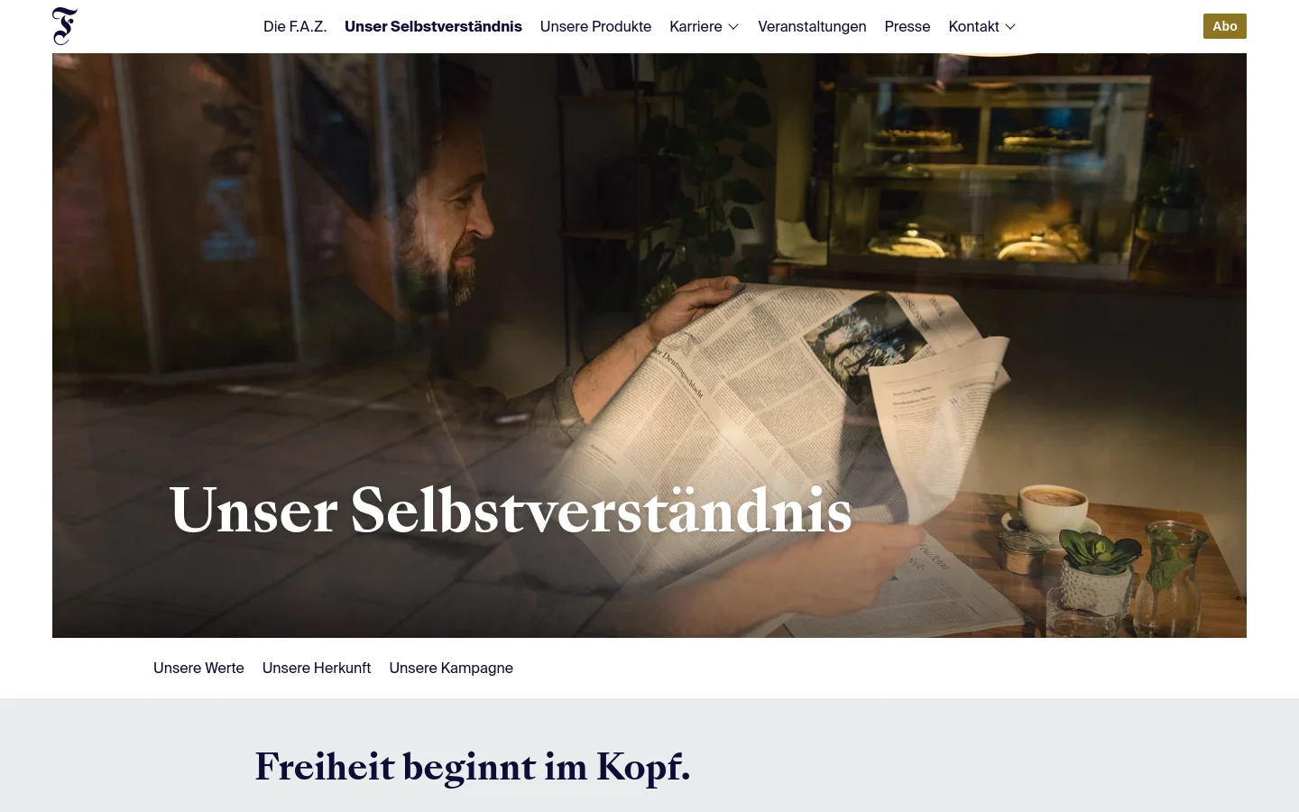 The desktop homepage features a large hero image of a man reading a newspaper in a cafe, overlaid with the headline 'Unser Selbstverständnis'. A white navigation bar at the top includes links like 'Die F.A.Z.' and 'Unser Selbstverständnis', along with an 'Abo' button. Below the hero section, a light gray sub-navigation bar offers links to 'Unsere Werte', 'Unsere Herkunft', and 'Unsere Kampagne'.