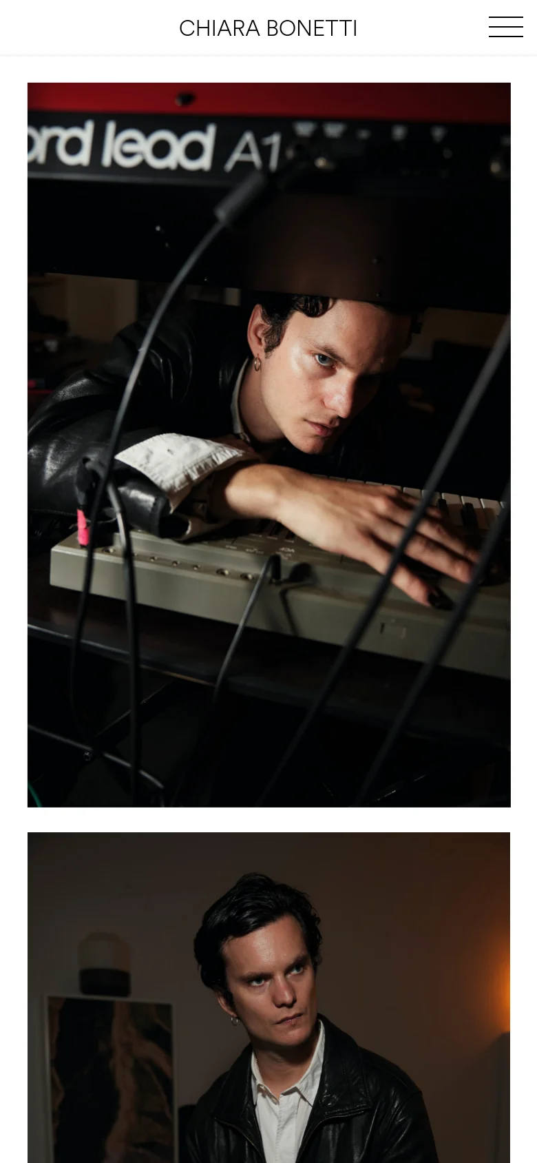 The mobile version maintains the minimalist white aesthetic but uses a single-column vertical layout. The large header text is centered, and the portrait images are stacked vertically to fit the narrow screen. Navigation is condensed into a hamburger menu icon at the top right.