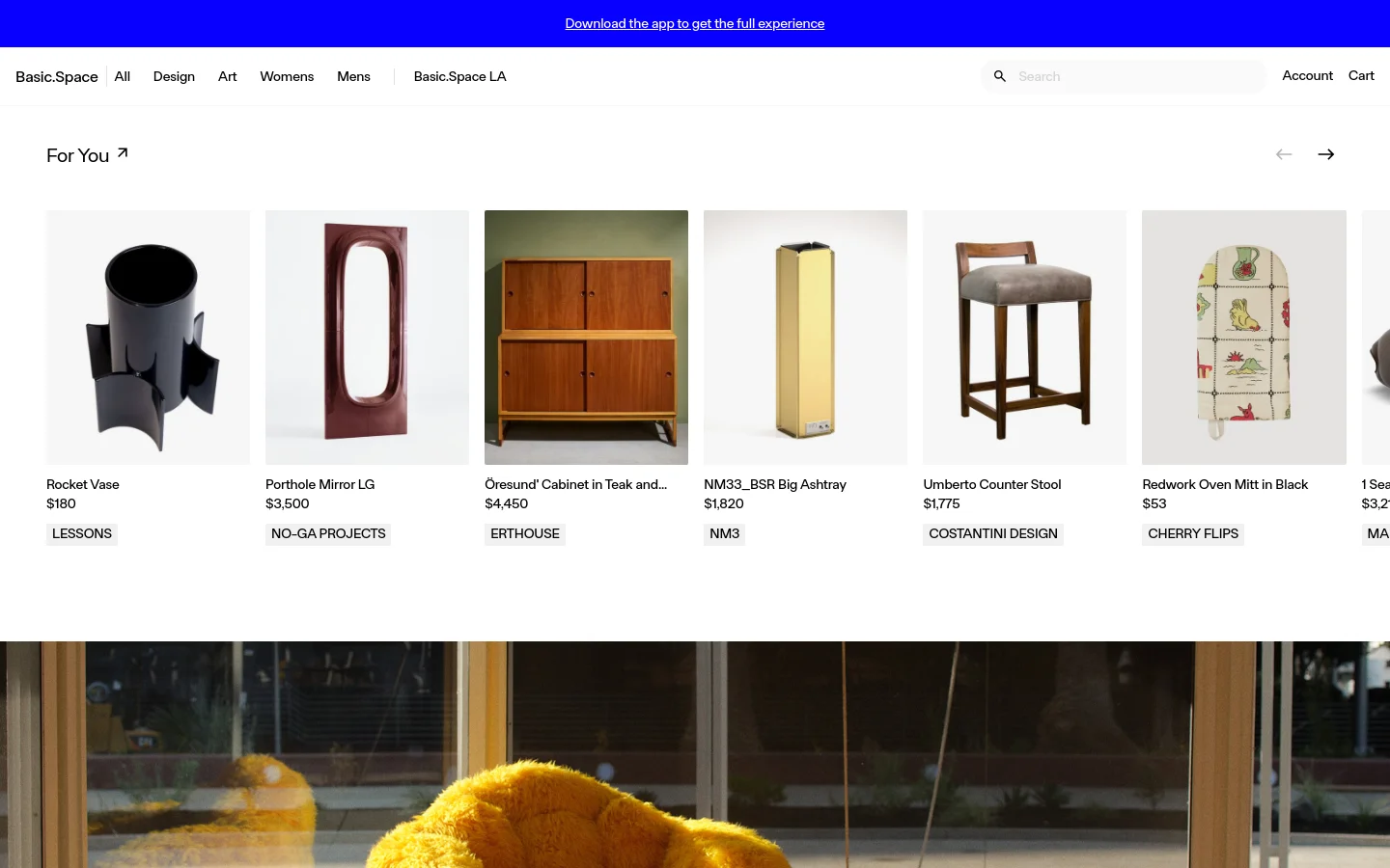 The desktop homepage features a minimalist white layout with a top navigation bar containing links for All, Design, Art, Womens, Mens, and Basic.LA. A 'For You' section displays a grid of curated lifestyle and furniture products, such as a Rocket Vase and Porthole Mirror, each with a high-quality image, title, price, and seller name. The design is clean with ample white space and simple black text.