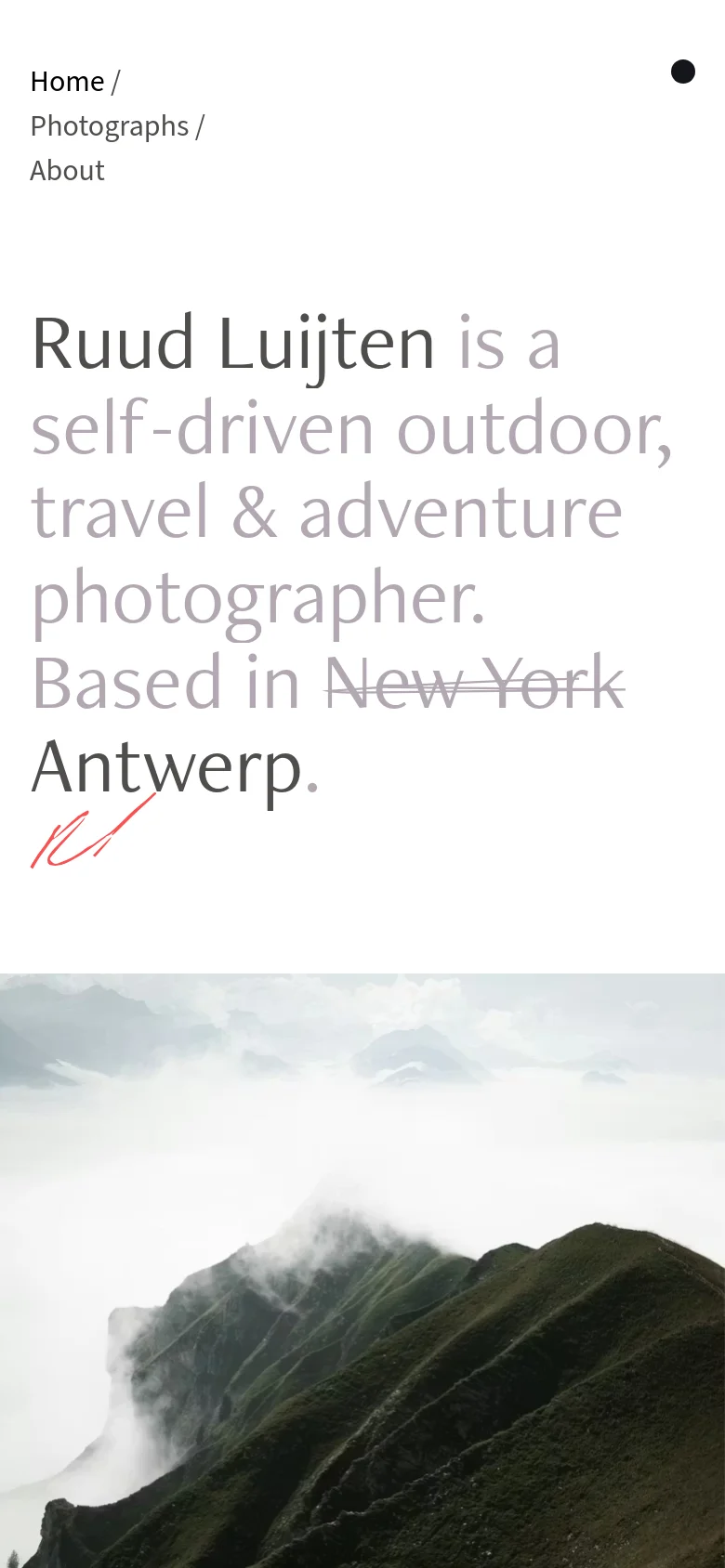 The mobile version uses a vertical stack where the large introductory text appears above the misty mountain landscape image. The navigation menu is condensed at the top left, and the overall layout focuses on readability through increased vertical spacing.