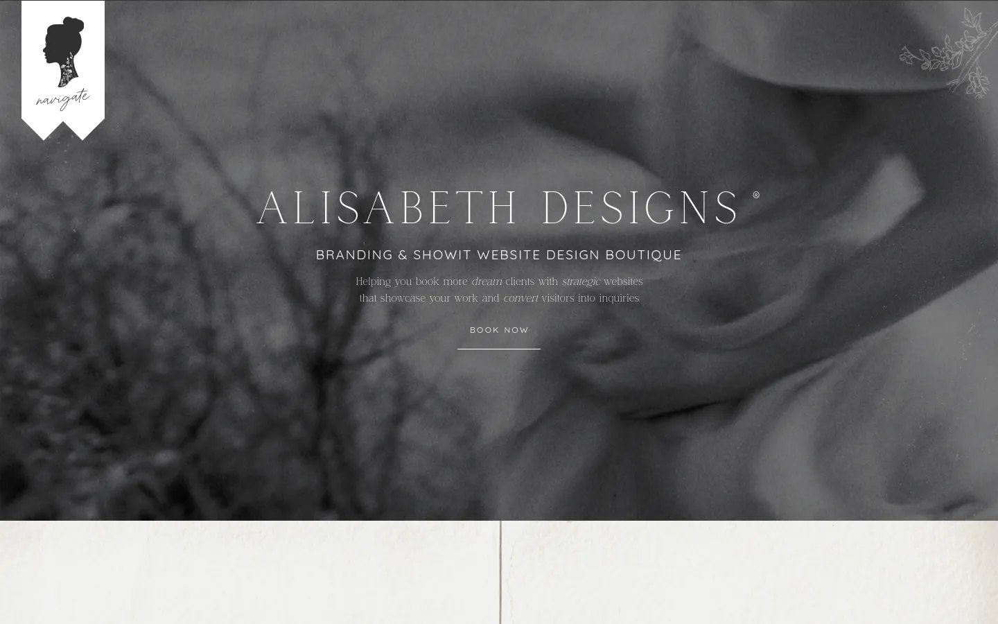Desktop homepage for Alisabeth Designs featuring a large, moody black and white hero image with elegant serif typography. The layout includes a navigation menu, a headline about branding and Showit website design, a 'Book Now' call to action, and a section introducing founder Sarah Alisabeth with a portrait photo. The color palette is neutral with soft, organic textures.