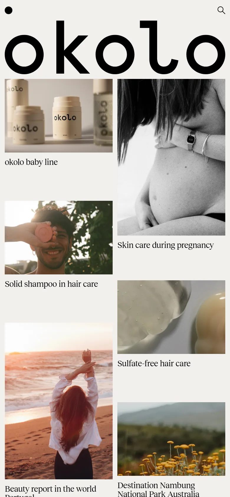 The mobile version maintains the minimalist aesthetic but transitions the desktop grid into a single-column vertical stack. The navigation is condensed, and the journal article tiles, featuring lifestyle and product photography, occupy the full width of the screen for easier scrolling.