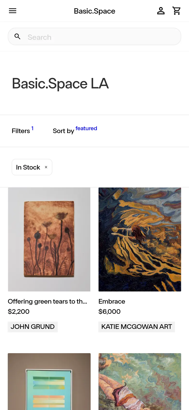 The mobile version maintains the minimalist white aesthetic but uses a single-column layout for the product grid to optimize vertical scrolling. The header is condensed into a hamburger menu, a centered logo, and icons for user account and shopping cart, with a prominent search bar below.