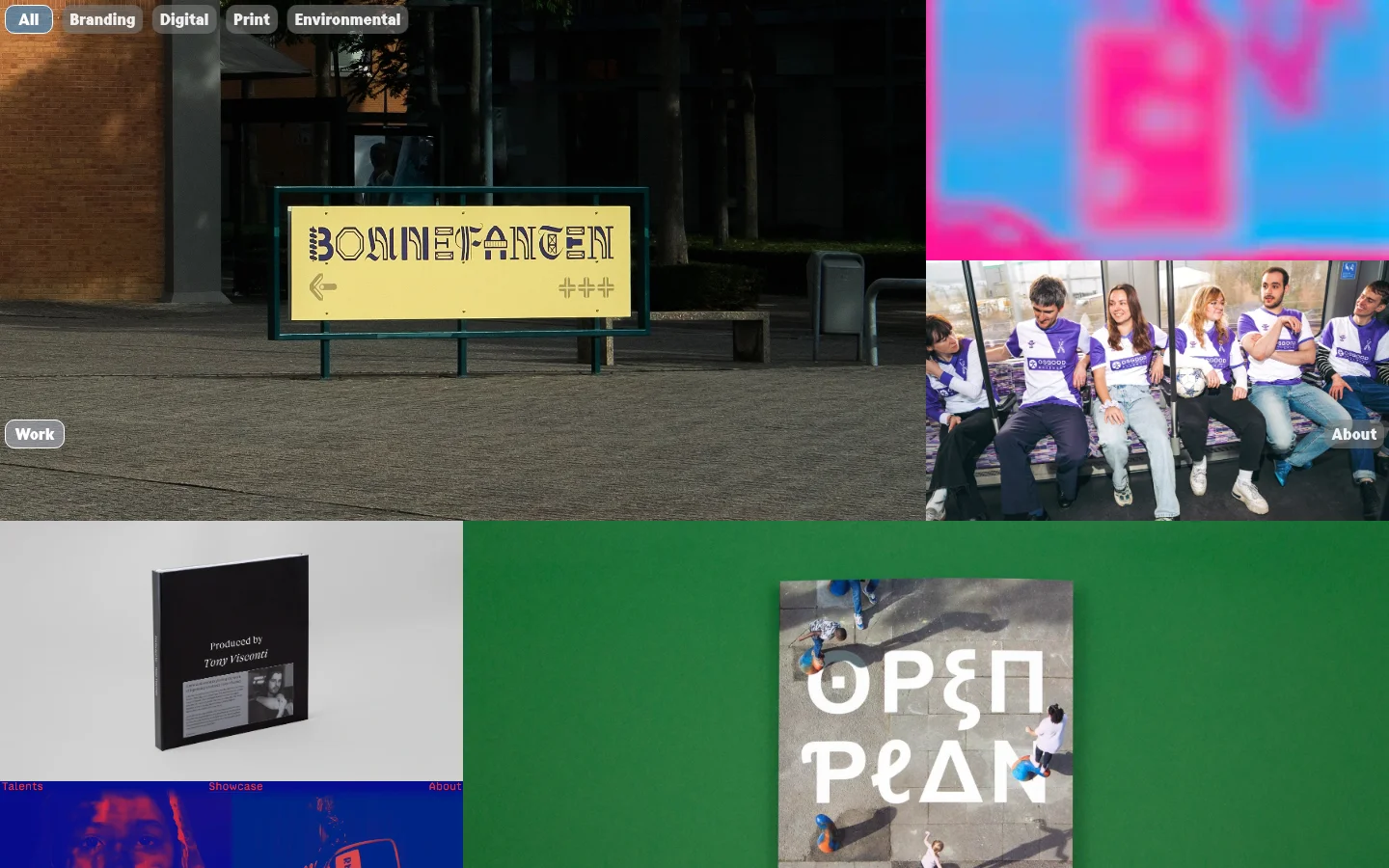 The desktop homepage features a minimalist design with a dark background and a grid of large, high-quality project images. A navigation bar at the top offers filters for All, Branding, Digital, Print, and Environmental, while 'Work' and 'About' buttons are positioned on the left and right sides. The layout uses a masonry-style grid to showcase diverse creative works.