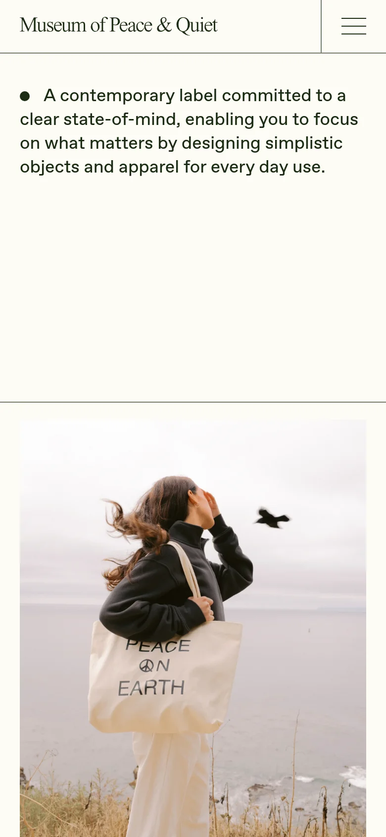 Museum of Peace & Quiet mobile homepage with a vertically stacked layout. The minimalist brand mission text appears above a full-width lifestyle image of a person carrying a cream tote bag by the ocean.