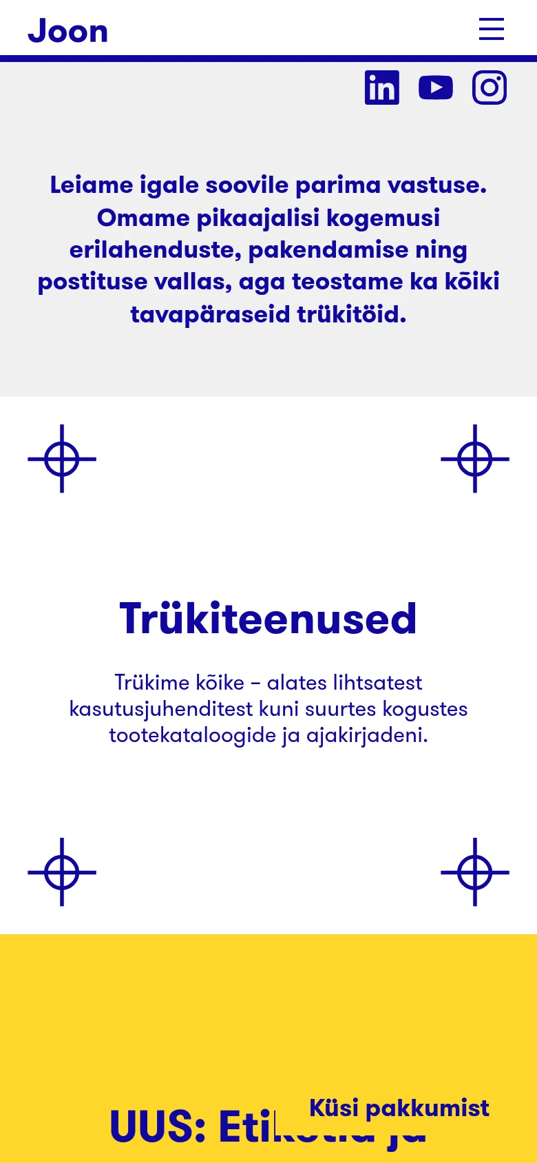 The mobile version presents a single-column vertical layout optimized for small screens. The navigation is condensed into a hamburger menu, and the service sections, such as Printing Services and the new Labels section, are stacked vertically with large, easy-to-tap text and icons.
