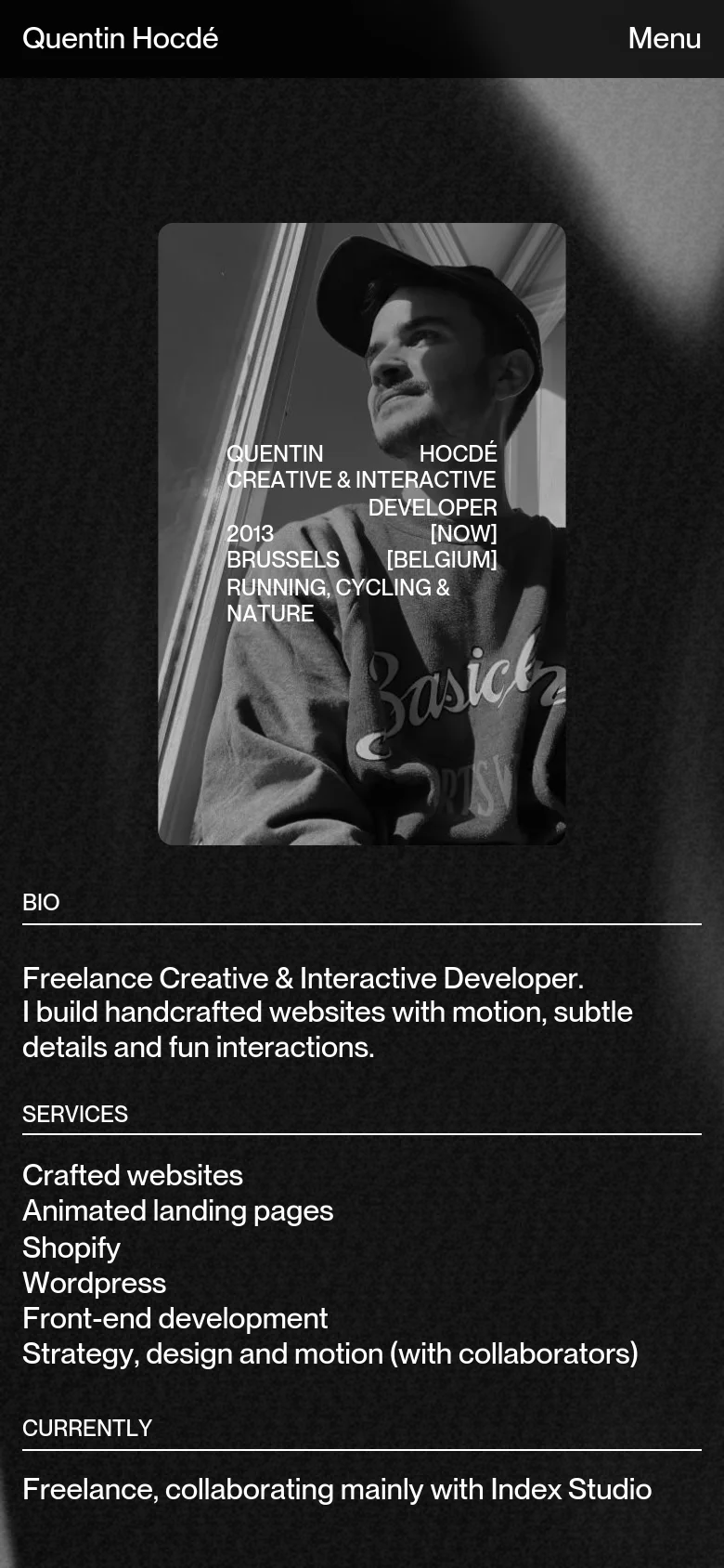 Quentin Hocdé about page with a stacked mobile layout. A large black and white portrait sits above vertically arranged text sections for bio, services, and current work, maintaining a dark, high-contrast minimalist design.