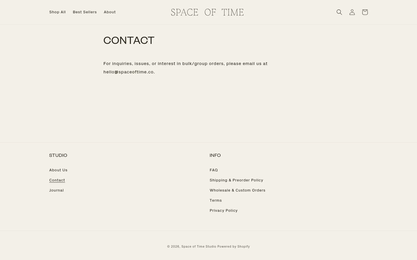 The desktop Contact page features a minimalist design with a light beige background and dark text. A centered headline reads 'CONTACT' above a brief instruction to email hello@spaceoftime.co for inquiries. The navigation bar at the top includes links for Shop All, Best Sellers, and About, alongside search, user, and cart icons, while the footer contains organized links under 'STUDIO' and 'INFO' headings.