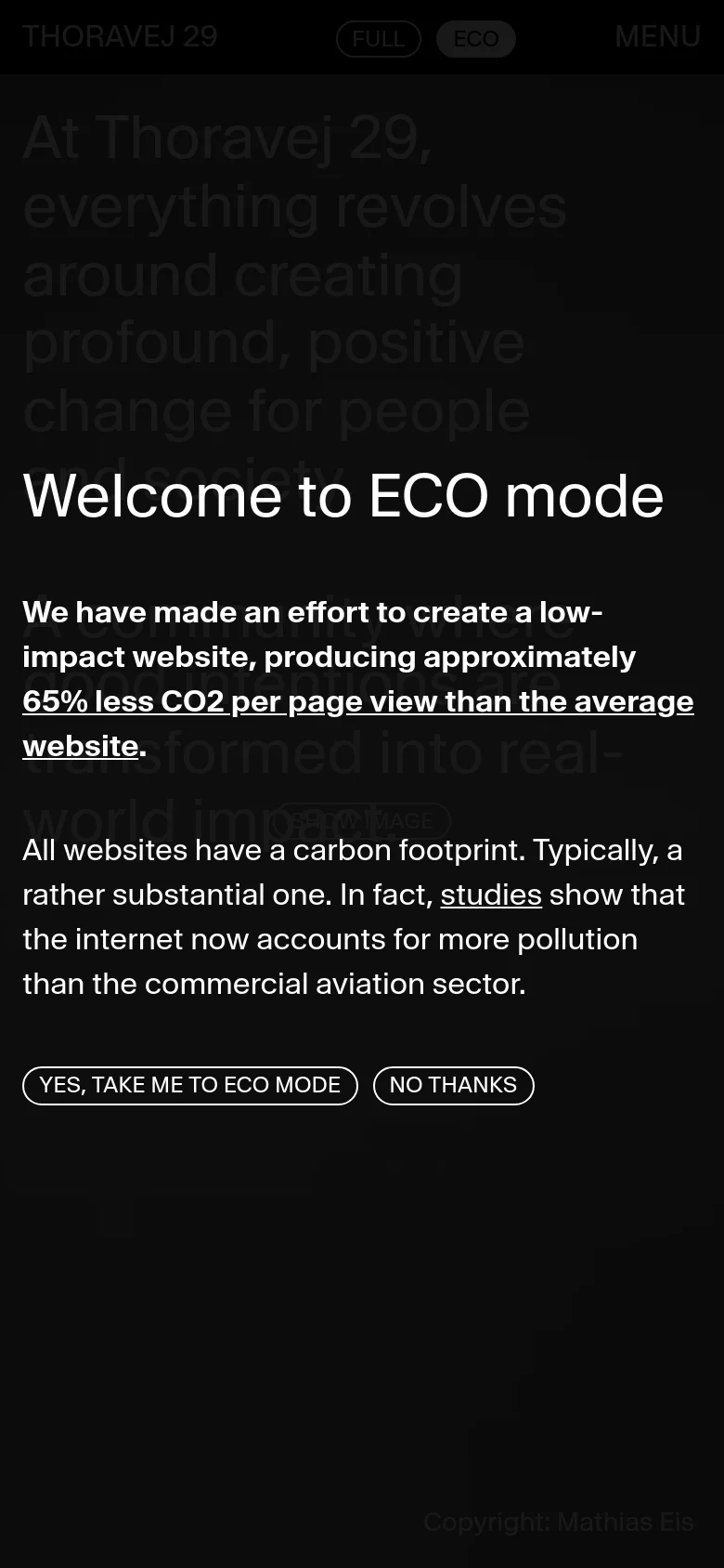 The mobile version displays a dark overlay titled 'Welcome to ECO mode' which explains the environmental benefits of using the low-impact version of the site. The text is white against a black background, featuring two primary call-to-action buttons: 'YES, TAKE ME TO ECO MODE' and 'NO THANKS'. The background shows a dimmed version of the hero image.