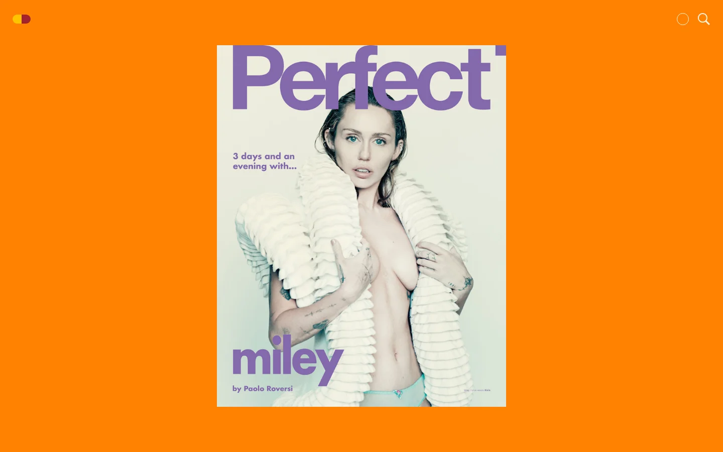 The desktop homepage features a vibrant orange background with a large, vertical magazine cover centered in the frame. The cover displays a portrait of Miley Cyrus wearing a white textured garment, with the large purple headline 'Perfect' at the top and 'miley' at the bottom. Navigation includes a small logo in the top left and search/menu icons in the top right.