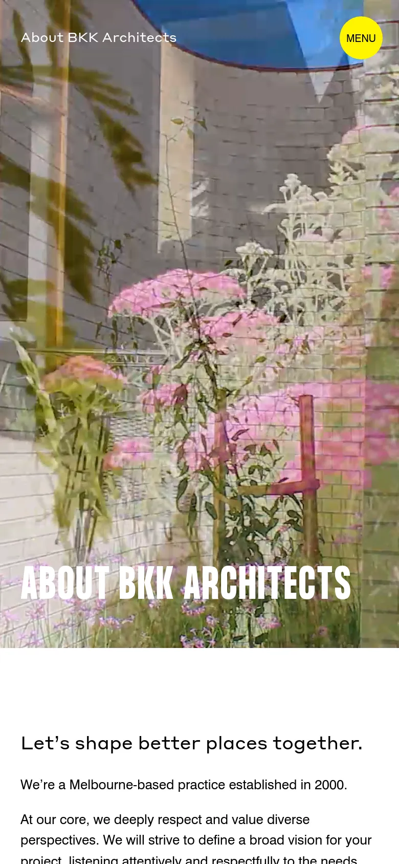 The mobile version maintains the large hero image of greenery and architecture but shifts the layout to a vertical orientation. The 'ABOUT BKK ARCHITECTS' headline is centered and prominent, while the yellow 'MENU' button is enlarged at the top right for easier touch access. Below the hero image, the text content begins on a plain white background.