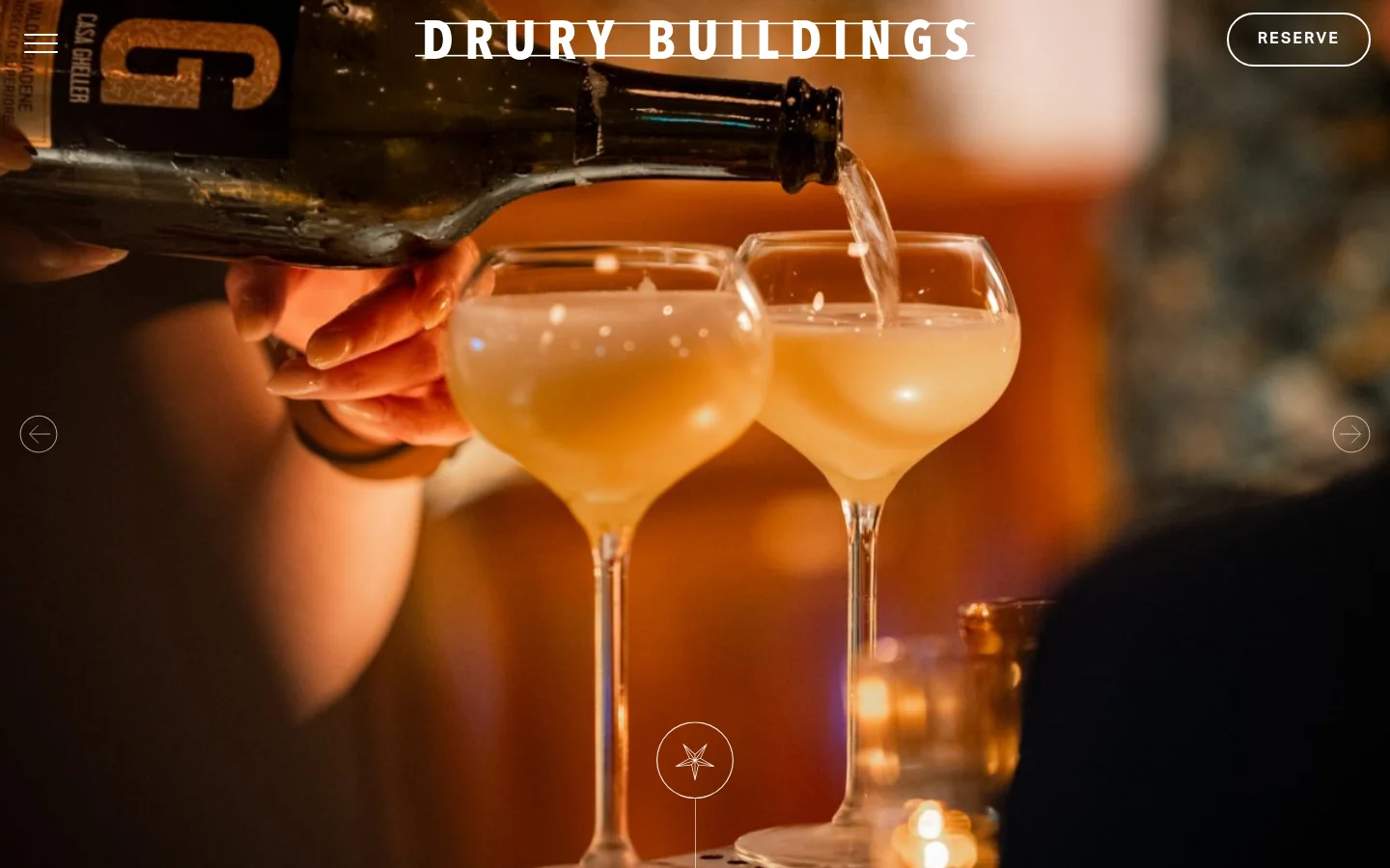 The desktop homepage features a large hero image of a cocktail being poured into glasses, with a navigation menu at the top and a 'RESERVE' call to action button. Below the hero section, a text block describes the venue's history and offerings, followed by a gallery of high-quality food and interior images and a 'Book a Table' button.