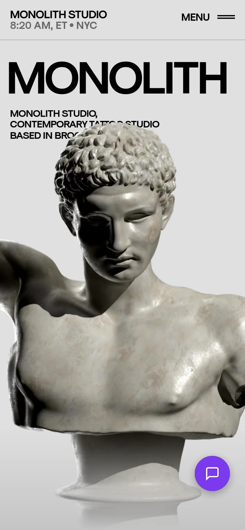 The mobile version maintains the minimalist aesthetic but uses a simplified layout with a 'MENU' hamburger icon at the top right. The large 'MONOLITH' text and classical bust hero image are scaled to fit the vertical screen, and the studio name and time are positioned at the top left.