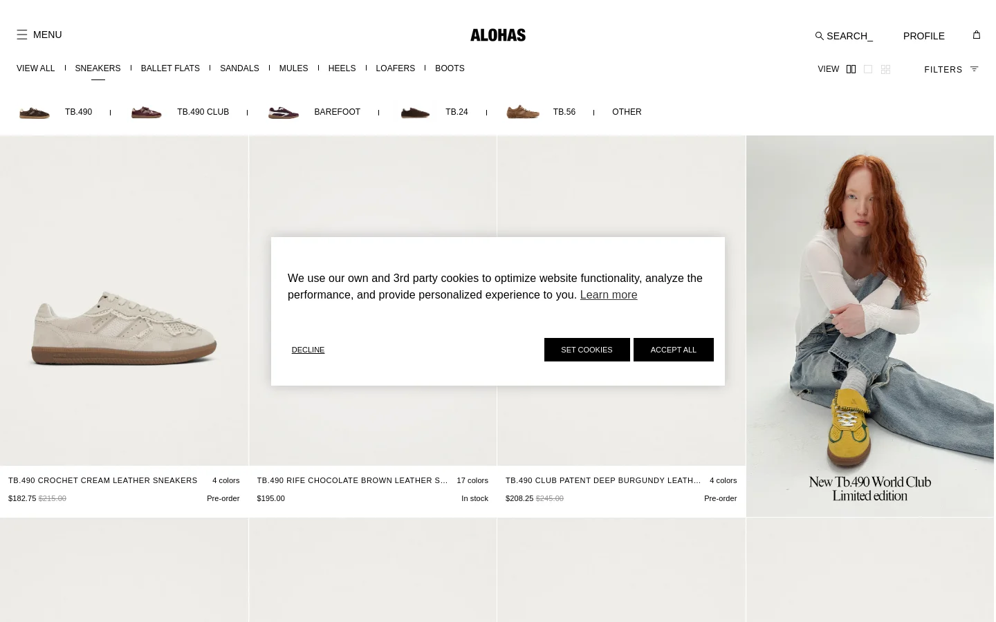 The desktop collection page for ALOHAS sneakers features a clean, minimalist layout with a white background and black text. A navigation menu at the top lists various shoe categories, followed by sub-category filters like TB.490 and BAREFOOT. The main content displays a grid of sneaker product images with titles, color options, and prices below each item.
