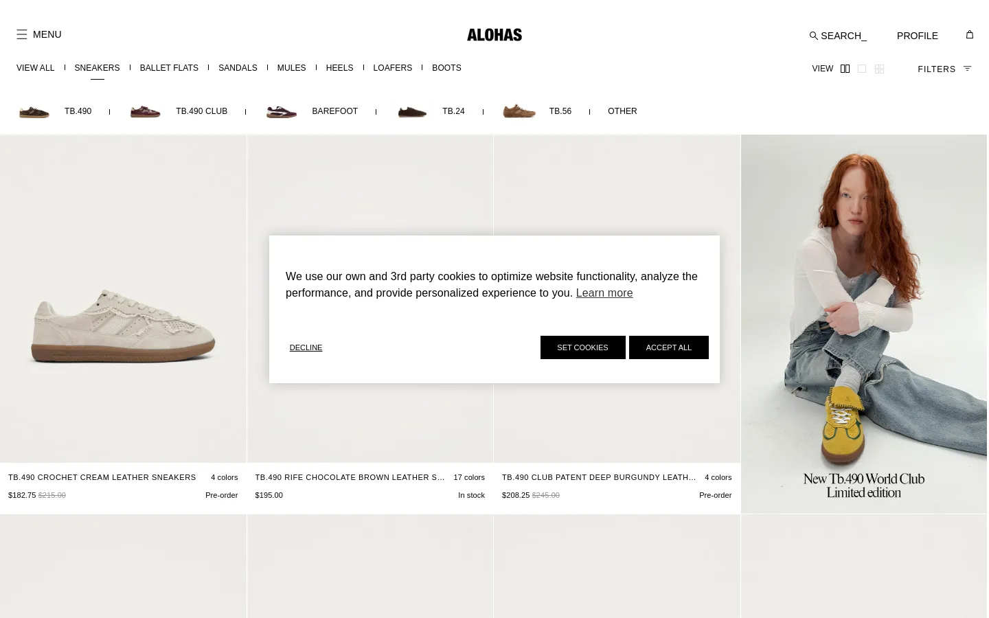 The desktop collection page for ALOHAS sneakers features a clean, minimalist layout with a white background and black text. A navigation menu at the top lists various shoe categories, followed by sub-category filters like TB.490 and BAREFOOT. The main content displays a grid of sneaker product images with titles, color options, and prices below each item.