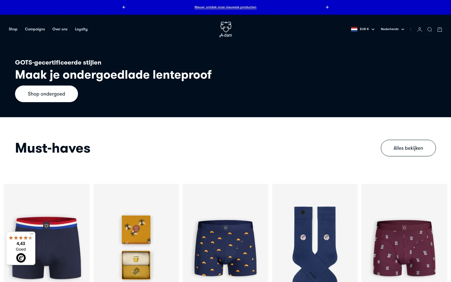 The desktop homepage features a dark navy hero section with the headline 'Maak je ondergoedlade lenteproof' and a 'Shop ondergoed' button. Below, a 'Must-haves' section displays a grid of product images including boxers and socks against a light gray background. The layout is spacious with a clean, minimalist aesthetic and a top navigation bar.