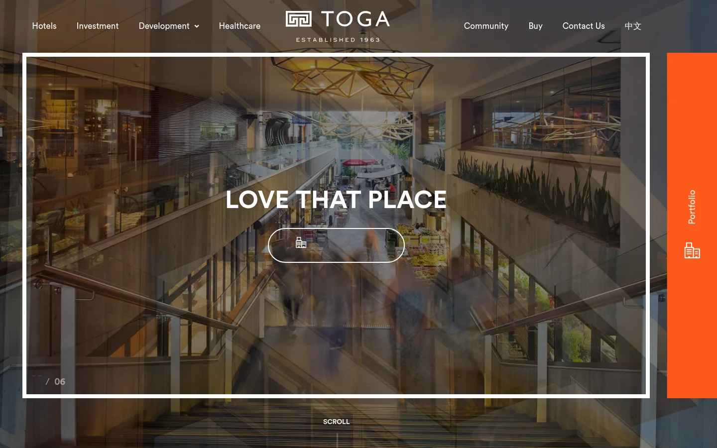 The desktop homepage features a wide navigation menu at the top with the TOGA logo centered. A large hero image shows a modern interior space with the headline 'LOVE THAT PLACE' and a call-to-action button labeled 'Explore our Projects'. An orange vertical sidebar on the right contains a portfolio icon.