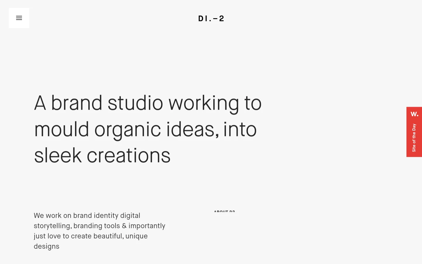The desktop About page features a minimalist design with a light gray background and black sans-serif typography. A large headline reads 'A brand studio working to mould organic ideas, into sleek creations,' followed by a subheadline and an 'About D2' section. A red vertical 'Site of the Day' badge is pinned to the right edge of the screen.