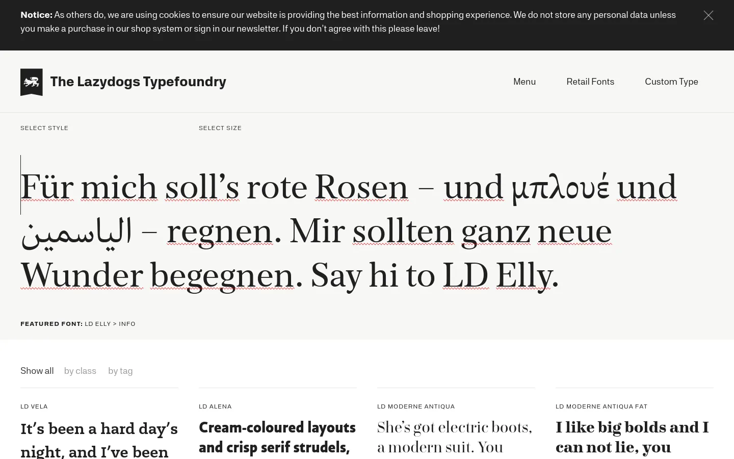 The desktop website for The Lazydogs Typefoundry features a clean, minimalist white layout with black text. A large hero section displays a typographic sample in multiple languages, followed by font filtering options by class and tag, and a grid of font previews below.