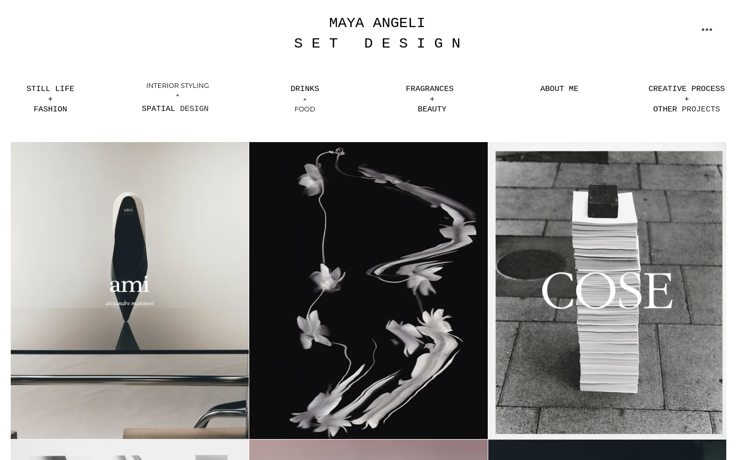 The desktop homepage for Maya Angeli Set Design features a minimalist white background with black serif typography. A navigation menu at the top lists various specialties, followed by a grid of large, high-quality artistic images showcasing still life, abstract floral shapes, and a stack of books.