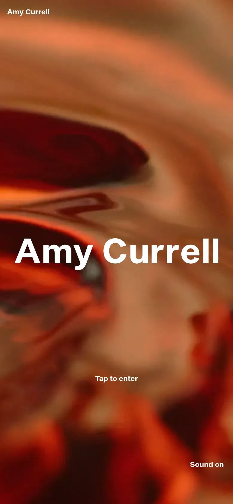 The mobile version presents a similar layout with the name 'Amy Currell' in large white text over a blurred, warm-toned abstract background. The navigation text is updated to 'Tap to enter' instead of 'Click to enter,' and the 'Sound on' link remains in the bottom right corner.